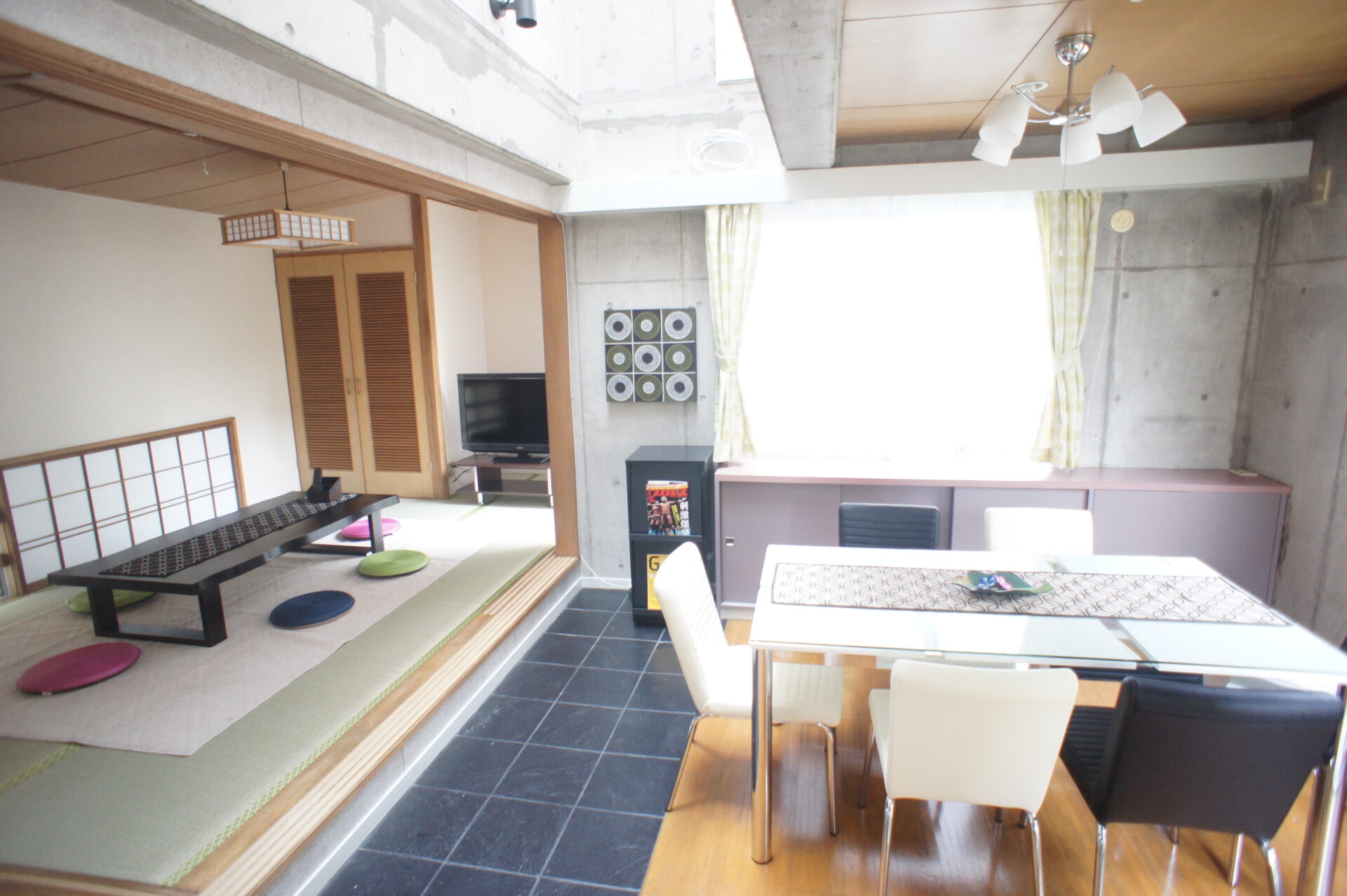 Shared living and dining area at Share House Sunajo